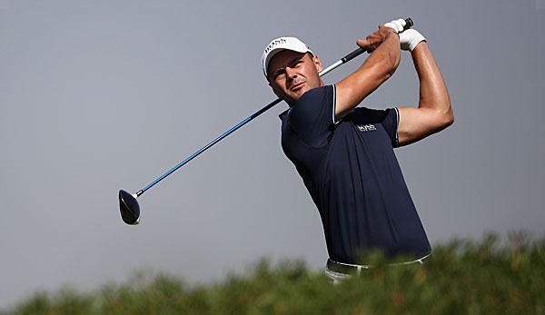 Golf: Abu Dhabi: former winner Kaymer loses sight of top spot