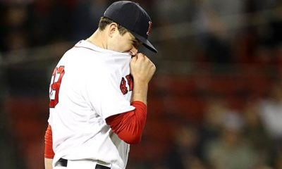 MLB: Sox-Pitcher injures his shoulder while throwing a glove