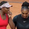 French Open: Williams sisters continue in doubles