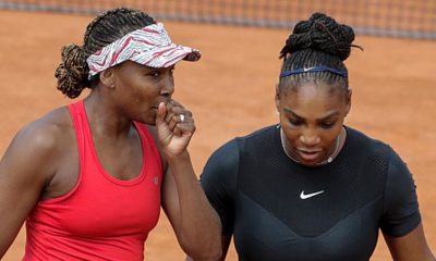 French Open: Williams sisters continue in doubles