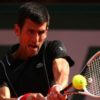 French Open: Djokovic through fast after marathon start