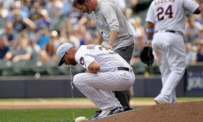 MLB: Players throw up twice on the lawn