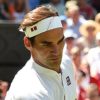 Wimbledon: Roger Federer on the double (and new outfit) in round two