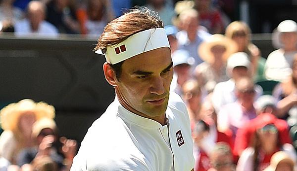 Wimbledon: Roger Federer on the double (and new outfit) in round two