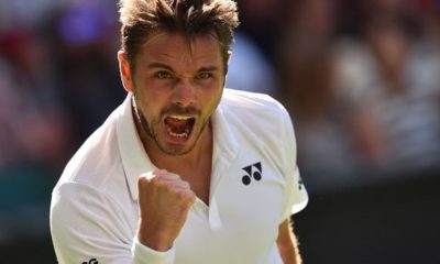 Wimbledon: Grigor Dimitrov defeats Stan Wawrinka