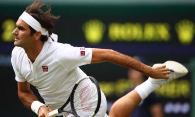 Wimbledon: Federer walks in round three