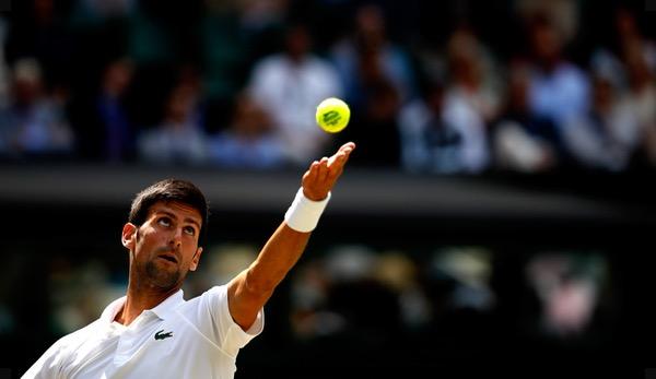 Wimbledon: Novak Djokovic wrestles Kei Nishikori