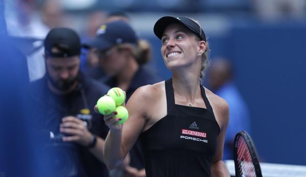 US Open: Angelique Kerber fights her way into round three