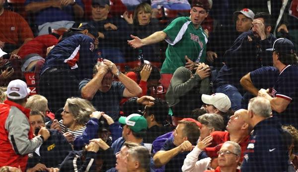 MLB: Fan of flying racket hit